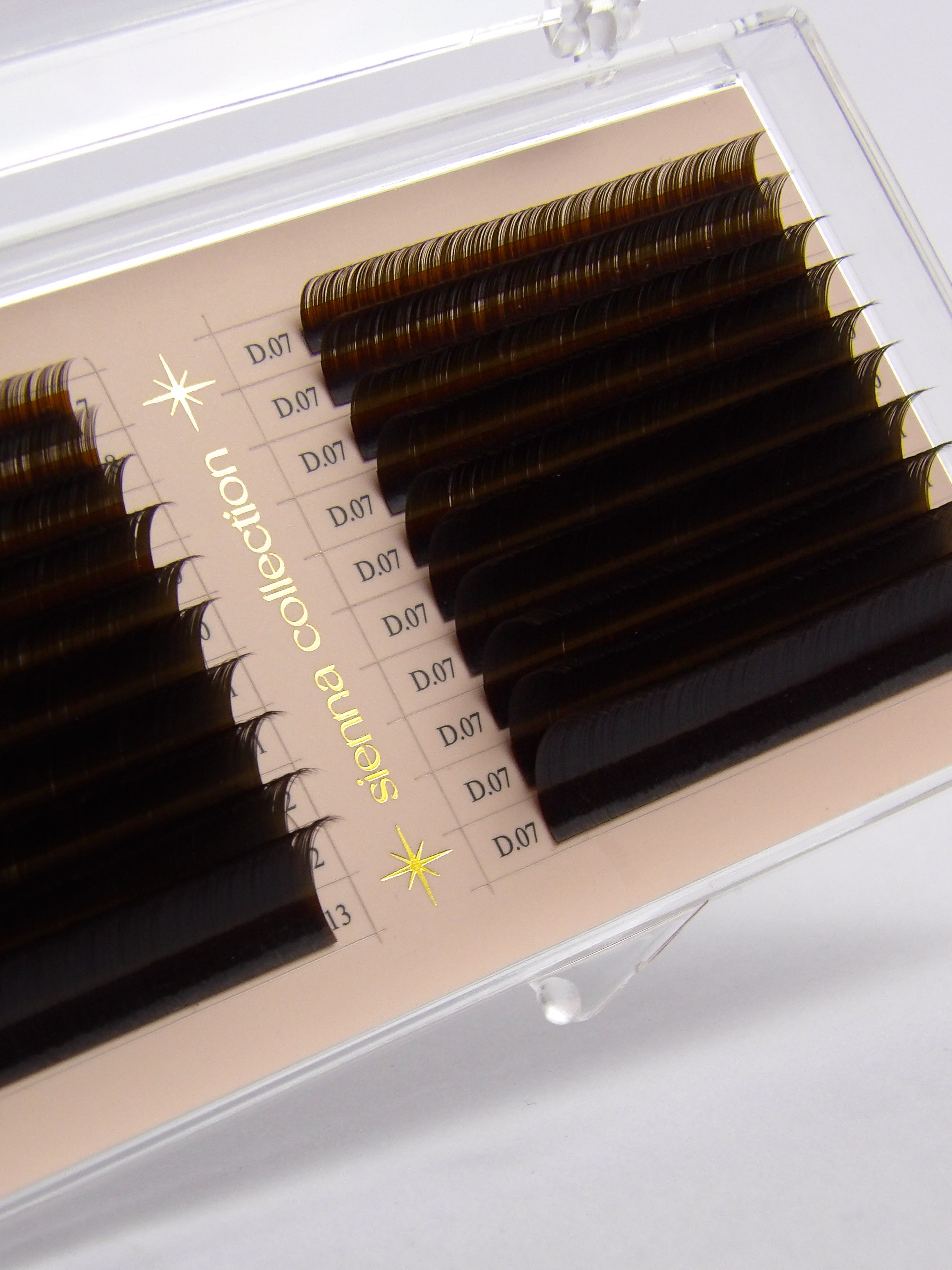 Eyelash extensions in a clear case with 'sienna collection' branding.