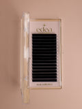 Eden eyelash packaging with false eyelashes on a beige background